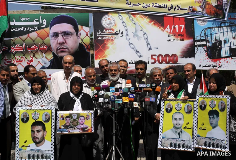 Palestinian Official of the Commission prisoners of the Islamic and national speaks during press conference, in solidarity with Palestinian prisoners being held in Israeli jails in Gaza City, on April 28, 2012. Photo by...