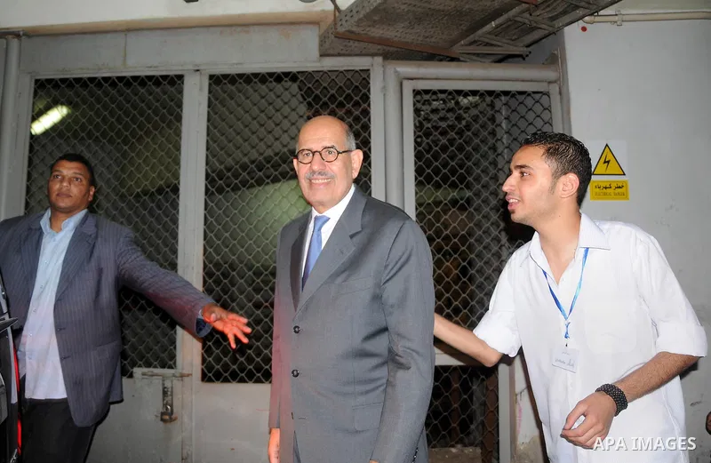 Egyptian Nobel Peace Prize winner and former head of the International Atomic Energy Agency, Mohamed ElBaradei addresses a press conference with novelist Alaa al-Aswany and other personalities, at the Egyptian Press Synd...