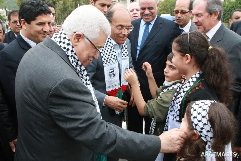 Palestinian President, Mahmoud Abbas (Abu Mazen), lays a wreath of flowers at the memorial to the martyrs of the Israeli raid in the hamam Al shat of Tunisia, in Tunis, on April 29, 2012. Photo by Thaer Ganaim