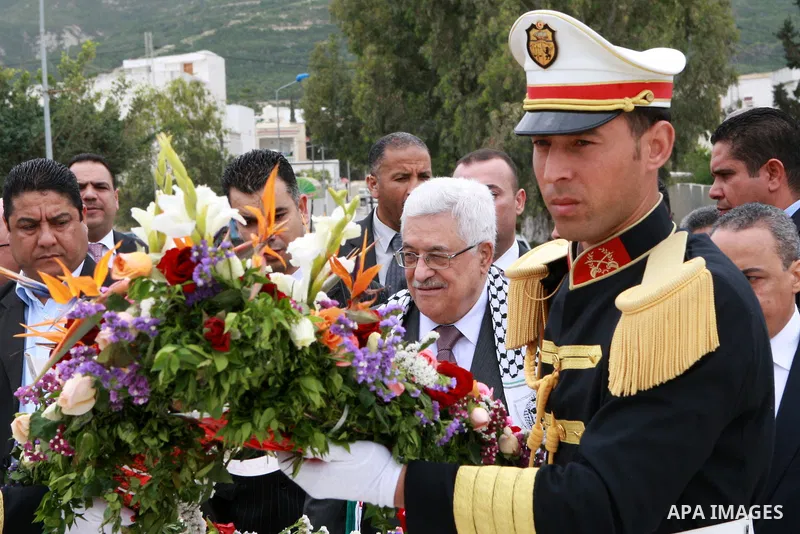 Palestinian President, Mahmoud Abbas (Abu Mazen), lays a wreath of flowers at the memorial to the martyrs of the Israeli raid in the hamam Al shat of Tunisia, in Tunis, on April 29, 2012. Photo by Thaer Ganaim