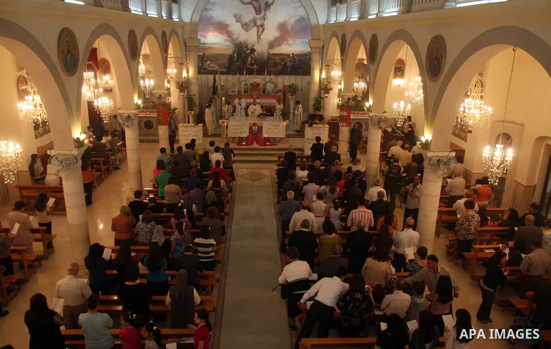 Palestinian Christians attend a special service in support of jailed Palestinians on hunger strike in Israeli prisons at a church in the West Bank city of Ramallah on April 29, 2012. Over the past week, Over 1,350 Palest...