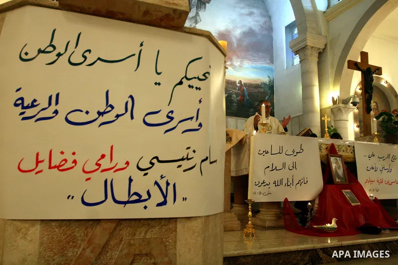 Palestinian Christians attend a special service in support of jailed Palestinians on hunger strike in Israeli prisons at a church in the West Bank city of Ramallah on April 29, 2012. Over the past week, Over 1,350 Palest...