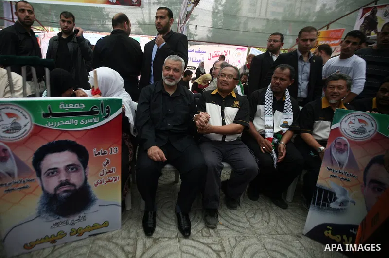Palestinian Prime minister in Gaza Ismail Haniyeh with Malaysian delegation, visit a Sit-in tent to show solidarity with Palestinians prisoners held in Israeli jails in Gaza City on April 30, 2012. At least 1,350 Palesti...