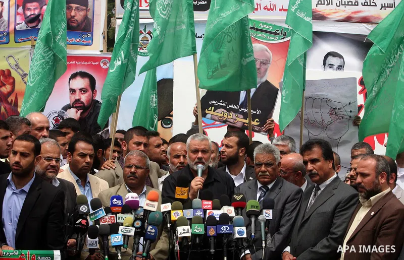 Palestinian Prime minister in Gaza Ismail Haniyeh speaks during Sit-in tent to show solidarity with Palestinians prisoners held in Israeli jails in Gaza City on April 30, 2012. At least 1,350 Palestinian prisoners being...