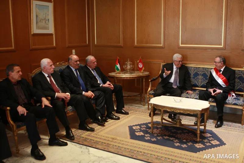 Palestinian president Mahmoud Abbas meets with the mayor of the city of Tunisia Saif Allah Al-Asram, in Tunisia, on April 30, 2012. Palestinian President Mahmud Abbas arrived in Tunisia on April 28 for a three-day offici...