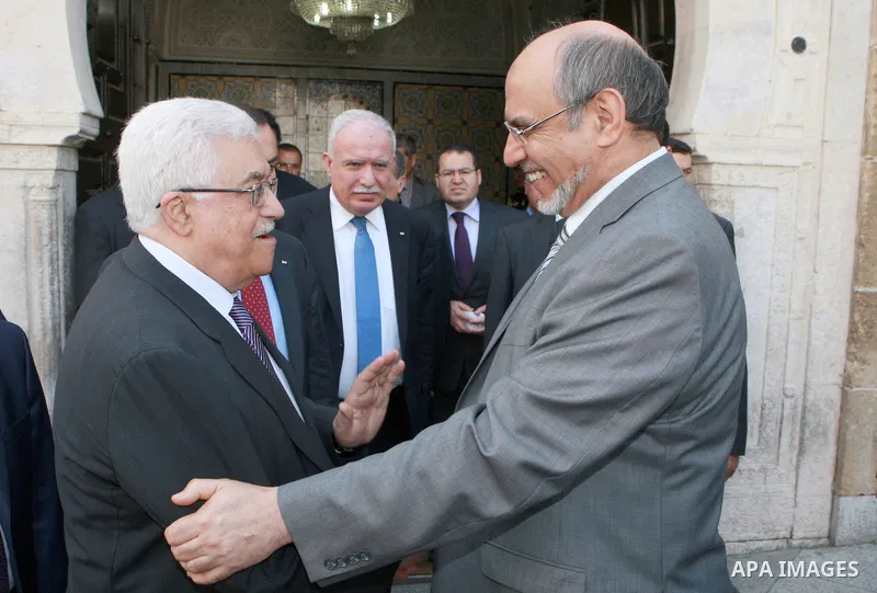 Palestinian president Mahmoud Abbas shakes hands with Tunisia's Prime Minister, Hamadi Jebali (R), in Tunisia, on April 30, 2012. Palestinian President Mahmud Abbas arrived in Tunisia on April 28 for a three-day official...