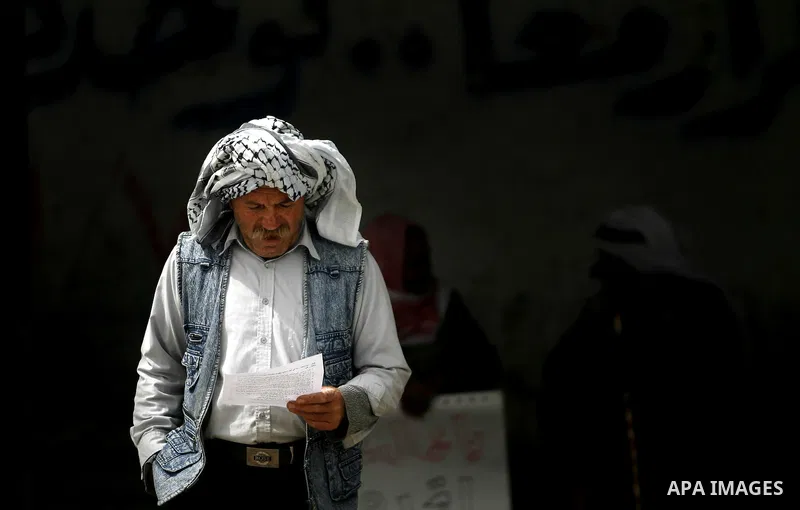 A Palestinian man participates a protest to mark "workers' Day" in Rafah town In Gaza Strip, on May 01, 2012. Photo by Eyad Al Baba
