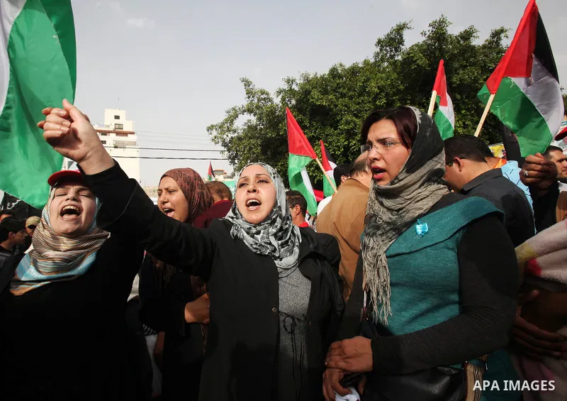 Palestinians shout slogans during a demonstration in "Worker's Day" in Gaza city, against israel's economic blockade of the Gaza Strip was imposed after the militant Hamas group violently seized power in the territory Fi...