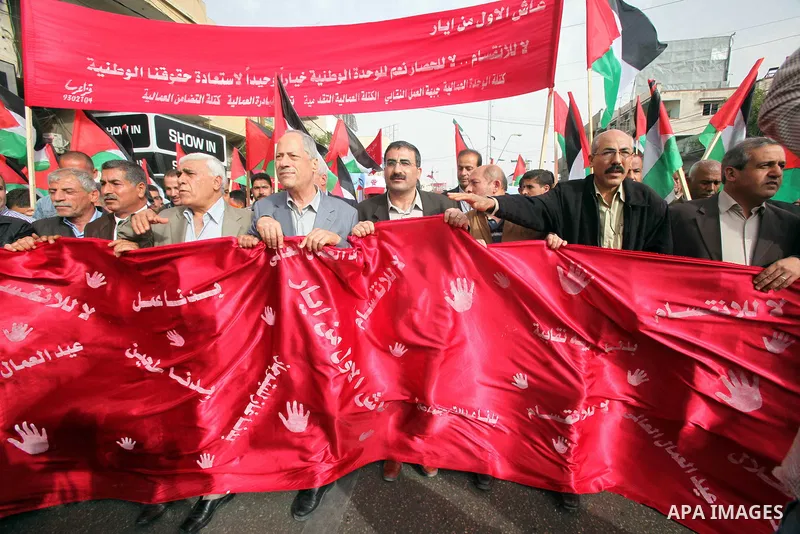 Palestinians shout slogans during a demonstration in "Worker's Day" in Gaza city, against israel's economic blockade of the Gaza Strip was imposed after the militant Hamas group violently seized power in the territory Fi...