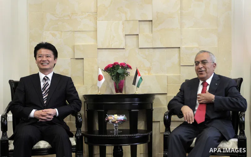 Palestinian Prime Minister Salam Fayyad, meets with Japanese Foreign Minister Koichiro Gemba, in the West Bank City of Ramallah, on May 02, 2012. Photo by Issam Rimawi