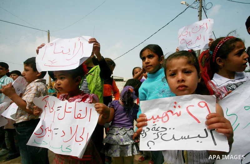 Palestinian Children of Al-Samuni family, protests against the Israeli military has decided on Tuesday, May 1, 2012 not to file any charges in one of the gravest incidents in its 2009 war in the Gaza Strip, closing its i...