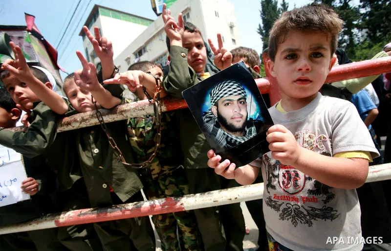 Palestinian Children chant slogans during a rally in Gaza City in support of more than a thousand prisoners who are on an open-ended hunger strike in Israeli jails on May 3, 2012. At least 1,550 Palestinians in Israeli j...