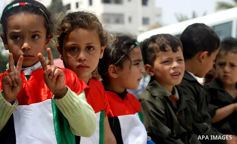 Palestinian Children chant slogans during a rally in Gaza City in support of more than a thousand prisoners who are on an open-ended hunger strike in Israeli jails on May 3, 2012. At least 1,550 Palestinians in Israeli j...