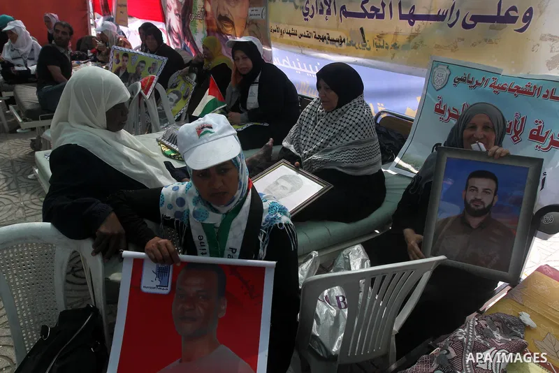 Palestinians participat at hunger striking during a sit-in tent held by Palestinian released prisoners, solidarity with Palestinian prisoners held in Israeli jails, in Gaza City on May 3, 2012. Over the past week, Over t...