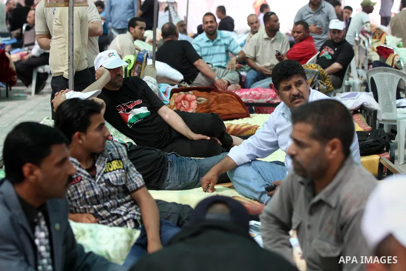 Palestinians participat at hunger striking during a sit-in tent held by Palestinian released prisoners, solidarity with Palestinian prisoners held in Israeli jails, in Gaza City on May 3, 2012. Over the past week, Over t...