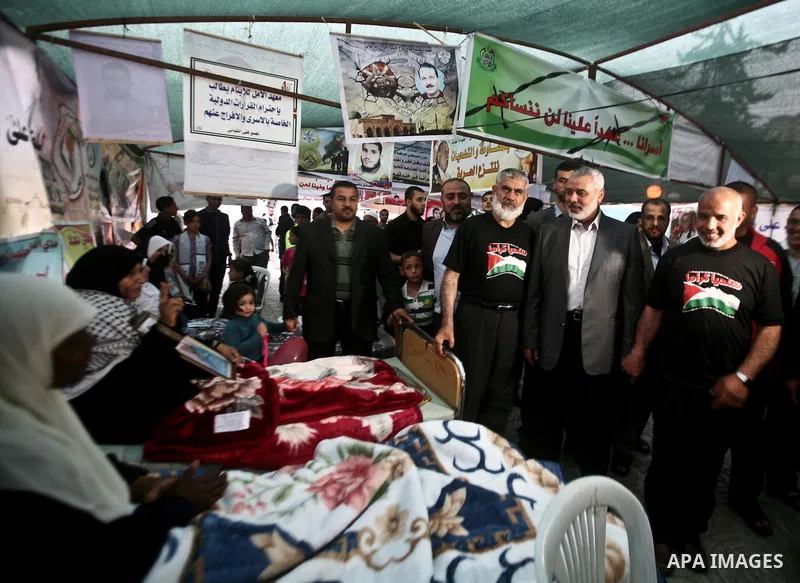 Palestinian Prime Minister in Gaza Ismail Hanyeh, visits Palestinians participat at hunger striking during a sit-in tent held by Palestinian released prisoners, solidarity with Palestinian prisoners held in Israeli jails...