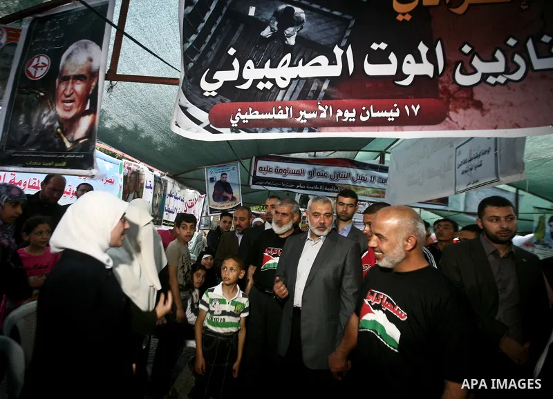 Palestinian Prime Minister in Gaza Ismail Hanyeh, visits Palestinians participat at hunger striking during a sit-in tent held by Palestinian released prisoners, solidarity with Palestinian prisoners held in Israeli jails...