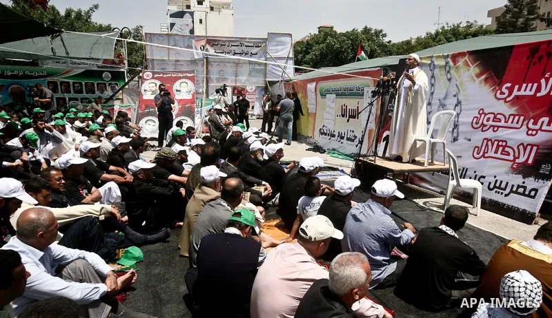 Palestinian Prime Minister in Gaza Ismail Haniyeh during the friday prayers at a sit-in tent held by Palestinian released prisoners, solidarity with Palestinian prisoners held in Israeli jails, in Gaza City on May 04, 20...