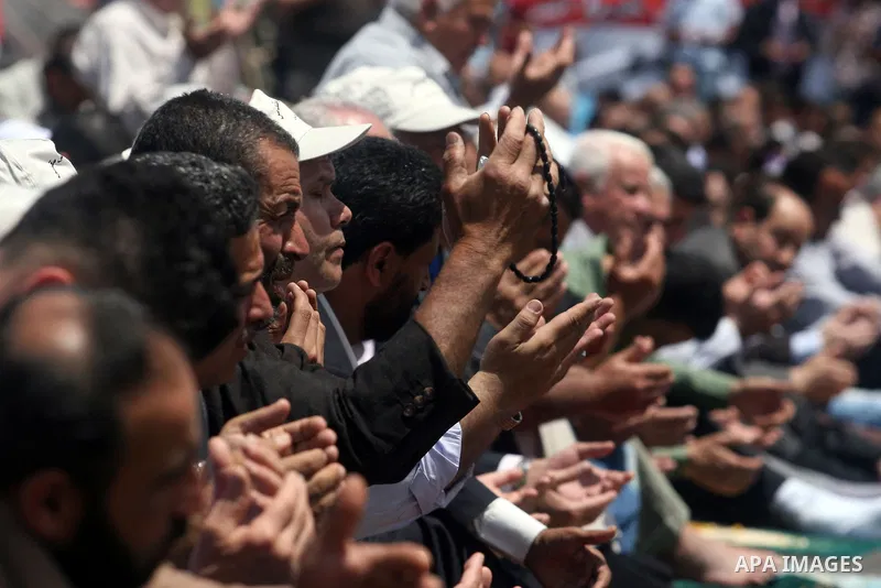 Palestinians perform Friday prayers during protest, in Ramallah, West Bank, May 04, 2012. An estimated 2,000 Palestinians held in prayer outside a tent in solidarity with prisoners who have been waging a hunger strike in...