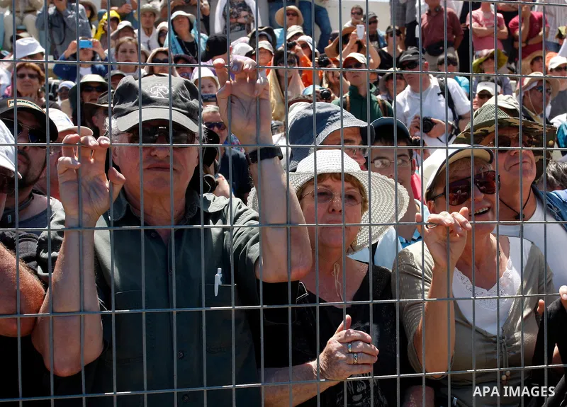 Samaritan people preparing to slaughter sheep during the Sacrifice of Passover ceremony at Mount Gerizim near the West Bank city of Nablus, late Friday May 4, 2012. The Samaritan religion is based on four principles of f...