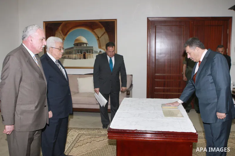 Palestinian president Mahmoud Abbas, meets with ambassador of the State of Palestine in Lebanon, Ashraf Dbor, during swear the constitutional oath, in the West bank, city of Ramallah, on May. 05, 2012. Photo by Thaer Gan...