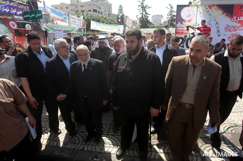 The spokesman of Hamas Parliament, Ahmed Bahar, take parts a protest during a rally to show solidarity with prisoners held in Israeli jails, in Gaza City May 6, 2012. A hunger strike by Palestinian prisoners against Isra...