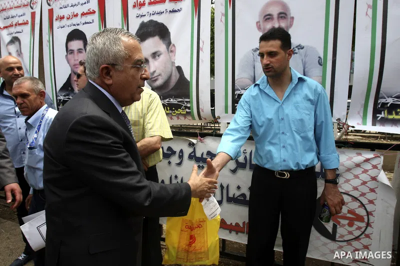 Palestinian Prime Minister Salam Fayyad during a support campaign for Palestinian prisoners on hunger strike Israeli jails, in the West Bank town of Nablus, Sunday , May 6, 2012 . Photo by Wagdi Eshtayah
