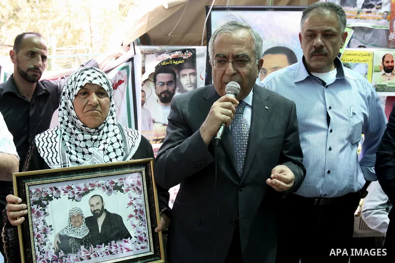 Palestinian Prime Minister Salam Fayyad during a support campaign for Palestinian prisoners on hunger strike Israeli jails, in the West Bank town of Nablus, Sunday , May 6, 2012 . Photo by Wagdi Eshtayah