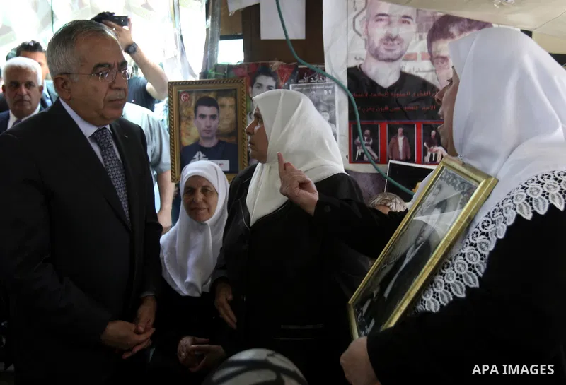 Palestinian Prime Minister Salam Fayyad during a support campaign for Palestinian prisoners on hunger strike Israeli jails, in the West Bank town of Nablus, Sunday , May 6, 2012 . Photo by Wagdi Eshtayah