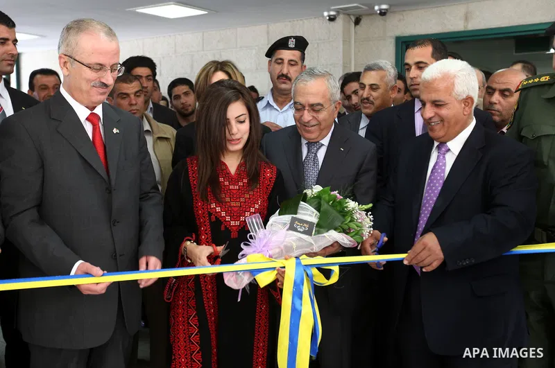 Palestinian Prime Minister, Salam Fayyad, attends opening of the exhibition of Fine Arts at An-Najah University National, in the West Bank town of Nablus, May 6, 2012. Photo by Mustafa Abu Dayeh