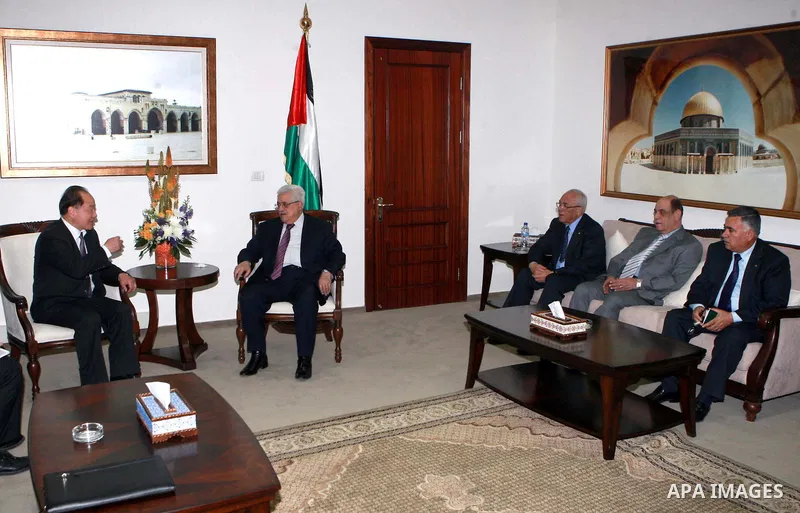 Palestinian president Mahmoud Abbas, meets with Chinese envoy to the peace process in the West bank city of Ramallah, on May. 07, 2012. Photo by Thaer Ganaim