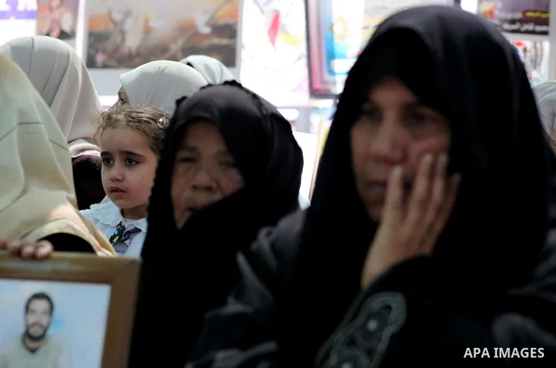 Palestinian women attend a rally in Gaza City, to show solidarity with Palestinian prisoners held in Israeli jails on May 7, 2012. At least 1,550 Palestinian prisoners are refusing food in Israeli jails in a protest agai...
