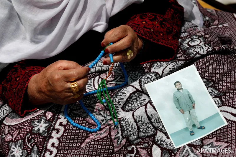Palestinian women attend a rally in Gaza City, to show solidarity with Palestinian prisoners held in Israeli jails on May 7, 2012. At least 1,550 Palestinian prisoners are refusing food in Israeli jails in a protest agai...