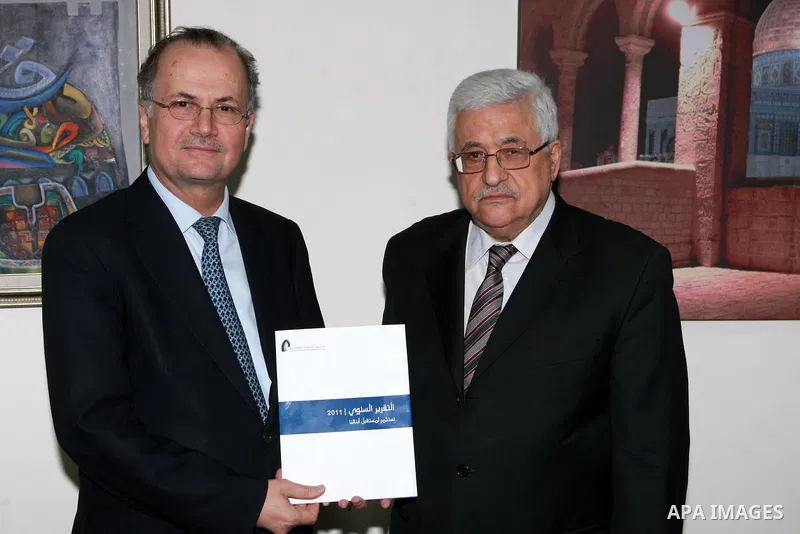 Palestinian President, Mahmoud Abbas (Abu Mazen) received the annual report of the Palestine Investment Fund, in the West Bank City of Ramallah, on May 07, 2012. Photo by Thaer Ganaim