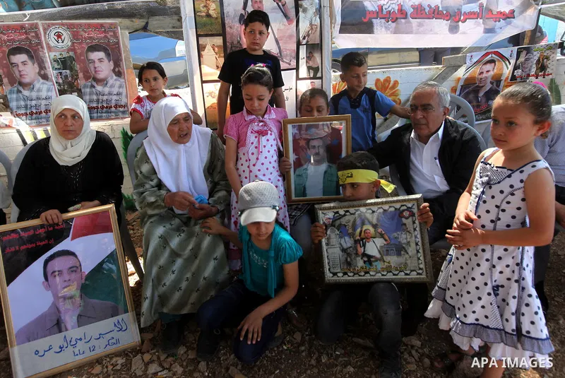Palestinian Prime Minister, Salam Fayyad, attends a rally in the West Bank town of Tubas, to show solidarity with Palestinian prisoners held in Israeli jails on May 7, 2012. At least 1,550 Palestinian prisoners are refus...