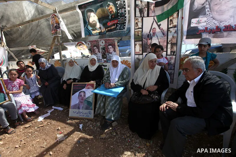 Palestinian Prime Minister, Salam Fayyad, attends a rally in the West Bank town of Tubas, to show solidarity with Palestinian prisoners held in Israeli jails on May 7, 2012. At least 1,550 Palestinian prisoners are refus...
