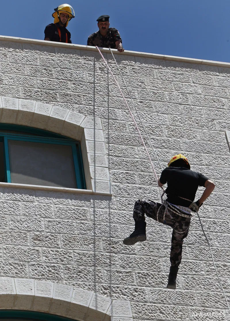 Palestinian Prime Minister, Salam Fayyad, (not seen) attends during a training session following the campaign "your Safety", in the West Bank City of Tubas, on May 07, 2012. Photo by Mustafa Abu Dayeh