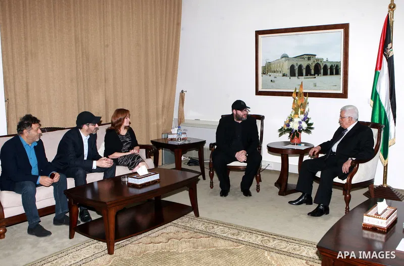 Palestinian President Mahmoud Abbas meets with the President of the Kabbalah center Yehuda Berg in West Bank City of Ramallah, on May 08, 2012. Photo by Mohammad Atiq