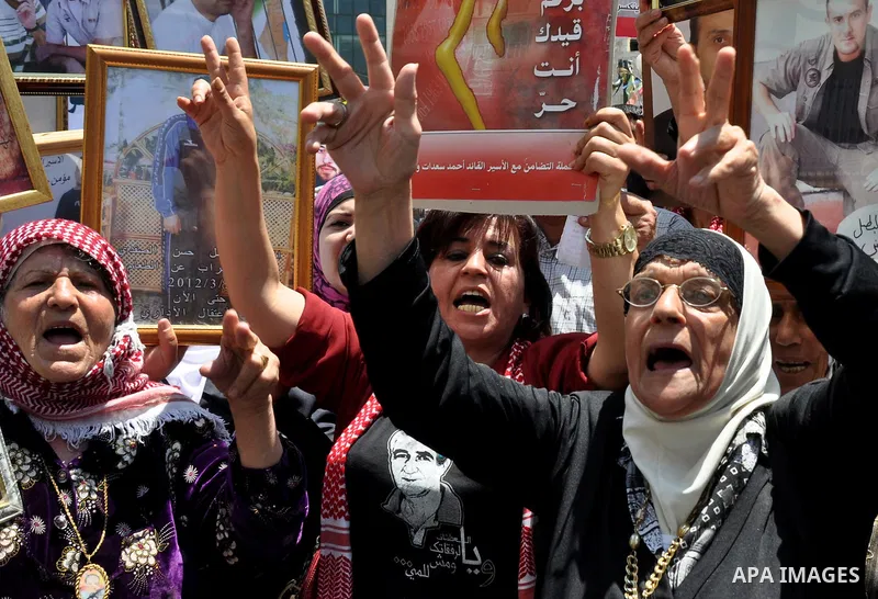 Palestinians participate in a rally supporting Palestinian inmates on hunger strike since mid-April 2012, in the West Bank City of Nablus, May 8, 2012.Photo by Nedal Shtieh