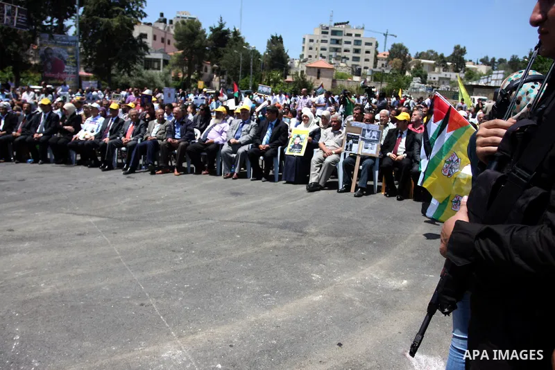 Palestinian Prime Minister Salam Fayyad,participates in a rally supporting Palestinian inmates on hunger strike since mid-April 2012, in the West Bank City of Ramallah, May 8, 2012. A Palestinian rights group said recent...