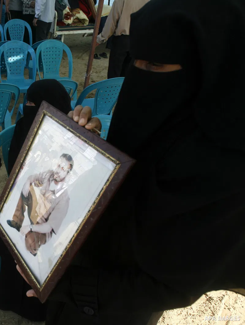 Palestinian Women participate in a rally supporting Palestinian inmates on hunger strike since mid-April 2012, in the Rafah in southern Gaza Strip, May 8, 2012. A Palestinian rights group said recently that half of about...