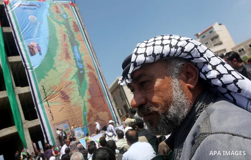 Palestinians take part in a rally in Gaza City ahead of Nakba May 9, 2012. On May 15 Palestinians will mark "Nakba," or catastrophe, of Israel's founding in a 1948 war, when hundreds of thousands of their brethren fled o...