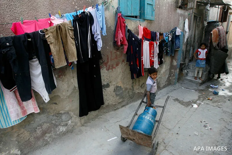 A Palestinian children in front of their house in the Rafah refugee camp in the southern area of the Gaza Strip on May 09 2012. On May 15 Palestinians will mark "Nakba," or catastrophe, of Israel's founding in a 1948 war...