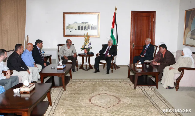 Palestinian President Mahmoud Abbas (Abu Mazen), meets with the families of prisoners on hunger strike held in Israeli jails. in the West Bank, city of Ramallah on May 09, 2012. Photo by Thaer Ganaim