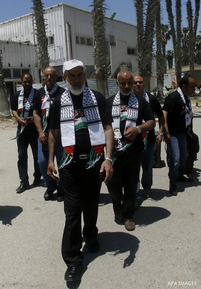 Palestinians delegation of released prisoners, leave the Rafah border crossing in the southern Gaza Strip on May 10, 2012. delegation will meet with Secretary General of the League of Arab States, Nabil Al Arabi, in Cair...