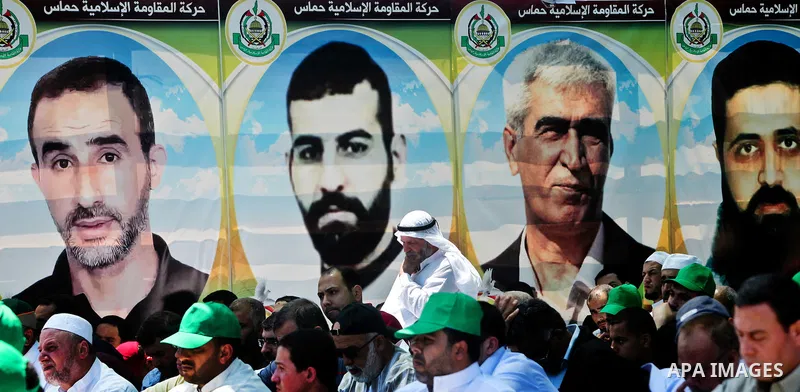 Palestinians attend Friday prayers in Gaza City in support of more than a thousand prisoners who are on an open-ended hunger strike in Israeli jails on May 11, 2012. At least 1,550 Palestinian prisoners are now on hunger...