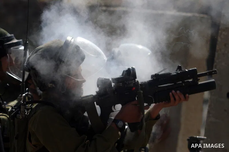 Israeli soldiers fire teargas canisters during clashes with Palestinian protesters outside the Ofer Prison near the West Bank city of Ramallah on May 11, 2012 following a demonstration in support of Palestinian prisoners...
