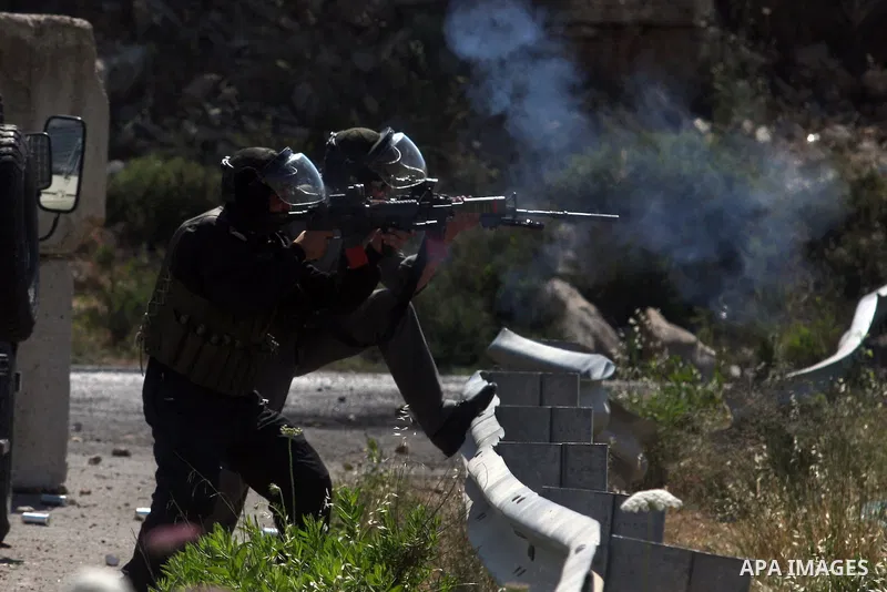 Israeli soldiers fire teargas canisters during clashes with Palestinian protesters outside the Ofer Prison near the West Bank city of Ramallah on May 11, 2012 following a demonstration in support of Palestinian prisoners...
