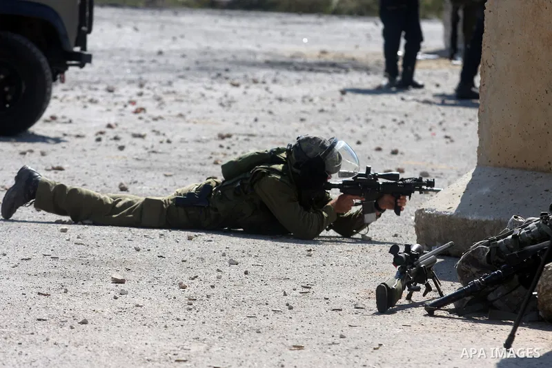 Israeli soldiers fire teargas canisters during clashes with Palestinian protesters outside the Ofer Prison near the West Bank city of Ramallah on May 11, 2012 following a demonstration in support of Palestinian prisoners...