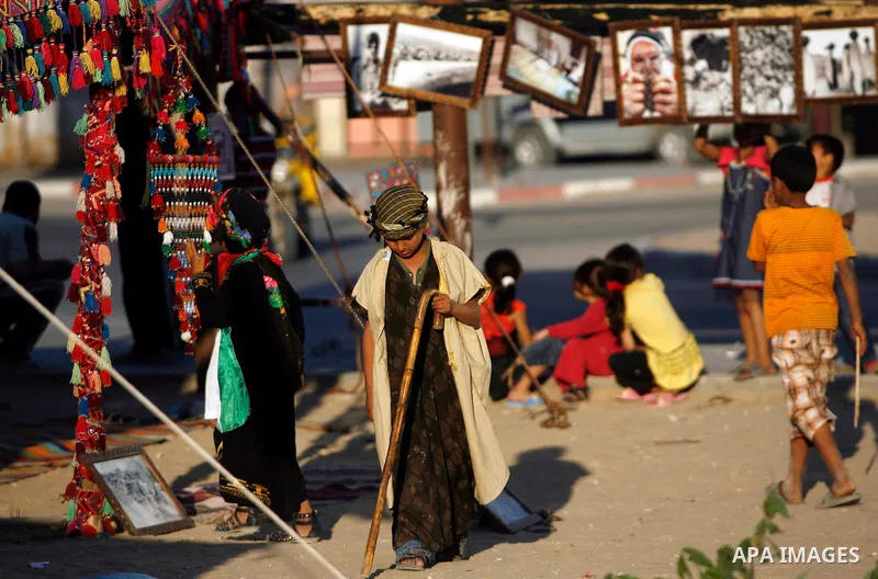 Palestinian children are seen during a Hamas rally ahead of Nakba, in Rafah refugee camp, Gaza City, 11 May 2012. Palestinians mark the 64rd anniversary of 'Nakba', or catastrophe, in reference to the creation of the sta...